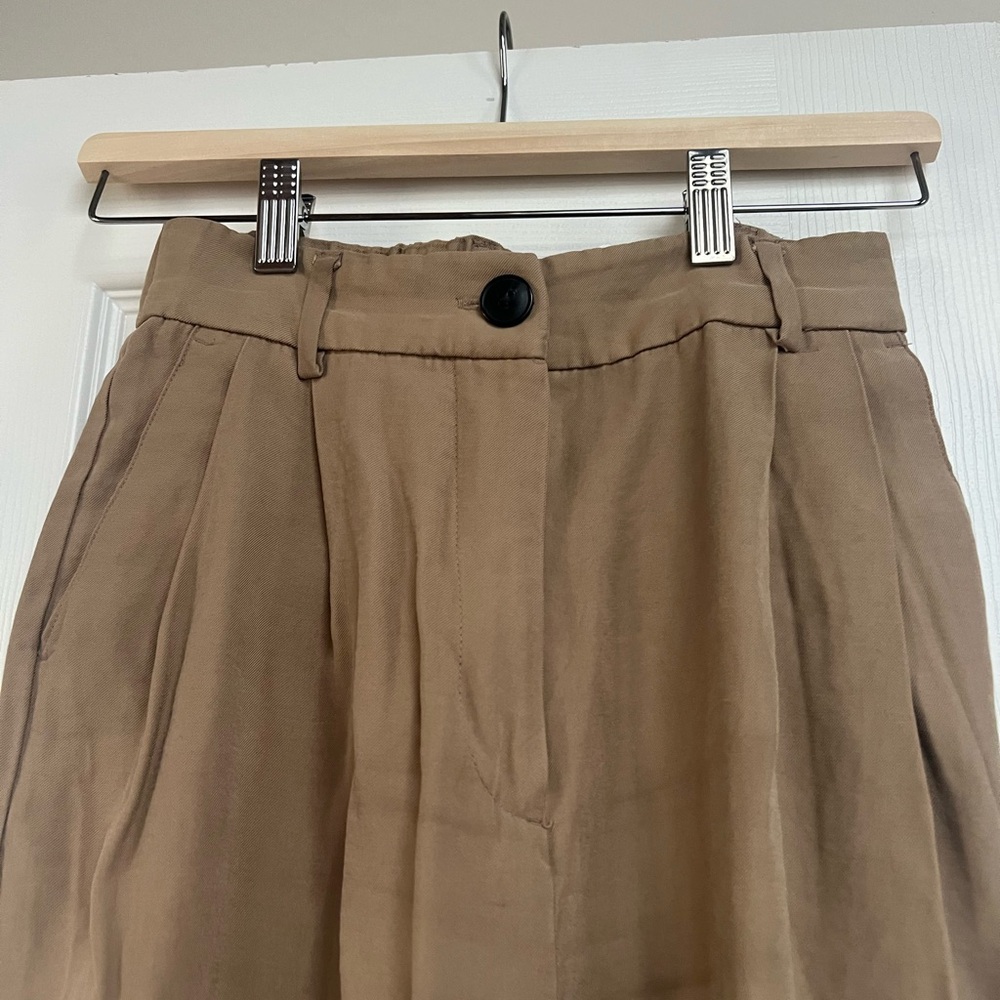 H&M beige trousers
Size 2 
Small stain on the back of pants